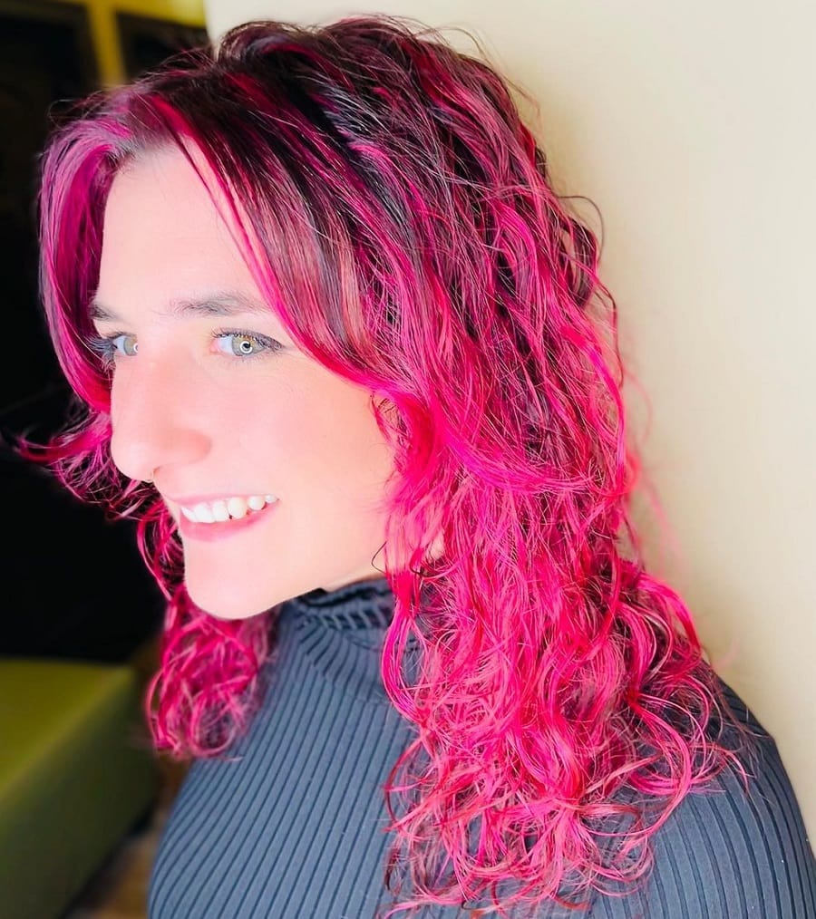 frizzy hair with pink highlights