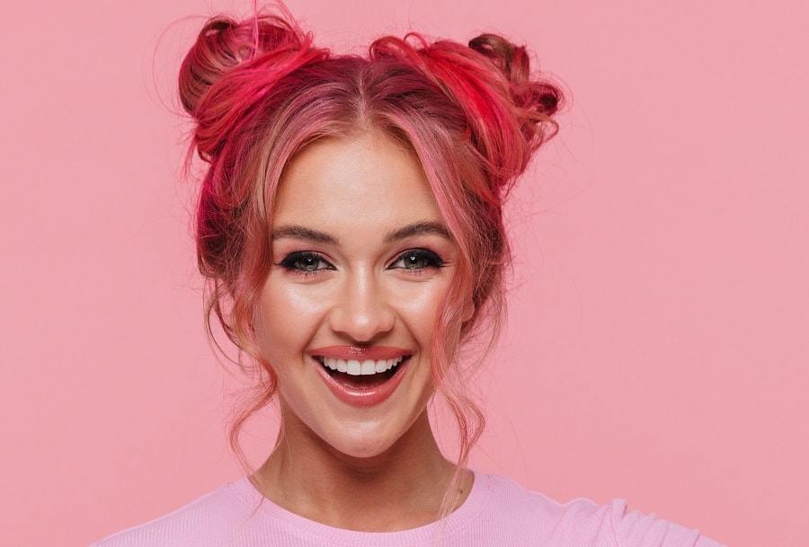 space buns with pink highlights