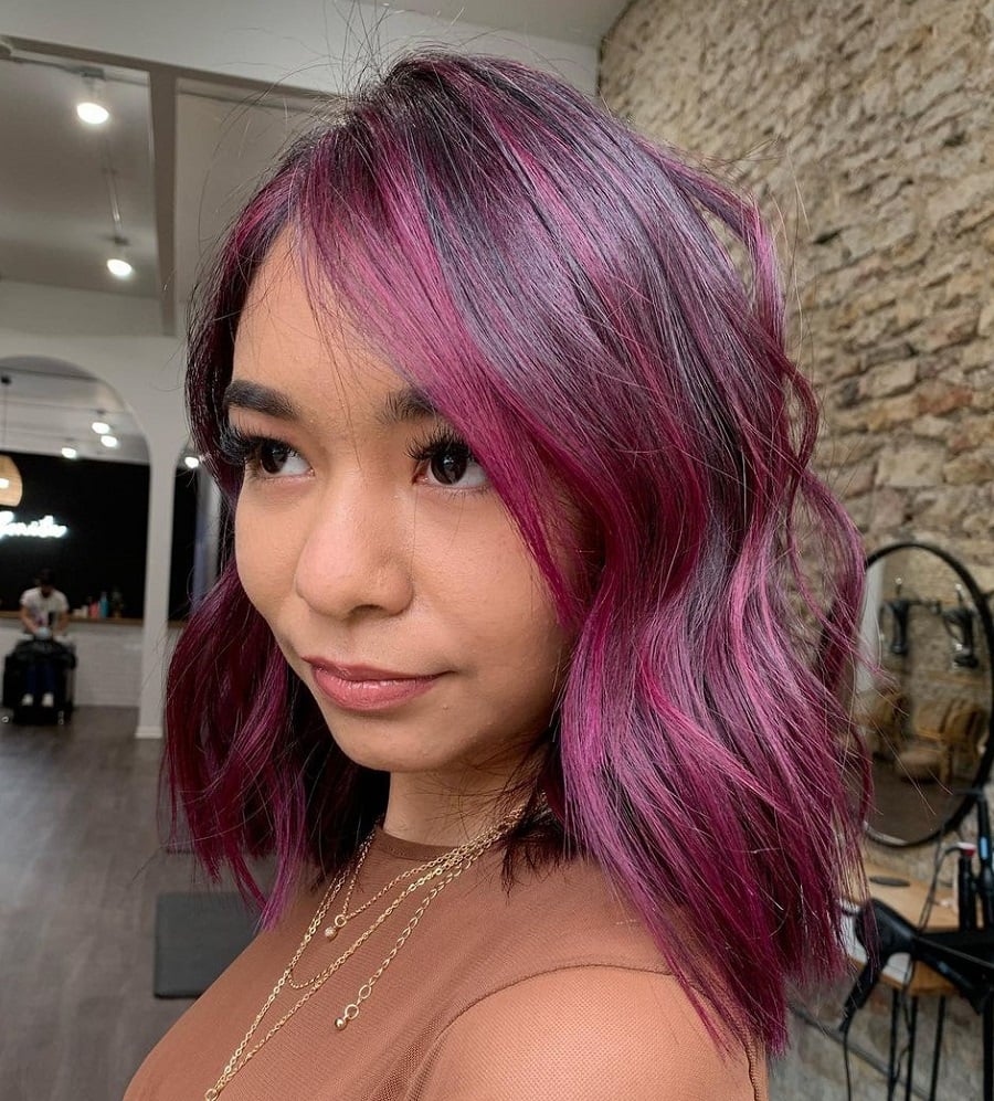 Asian woman with plum hair