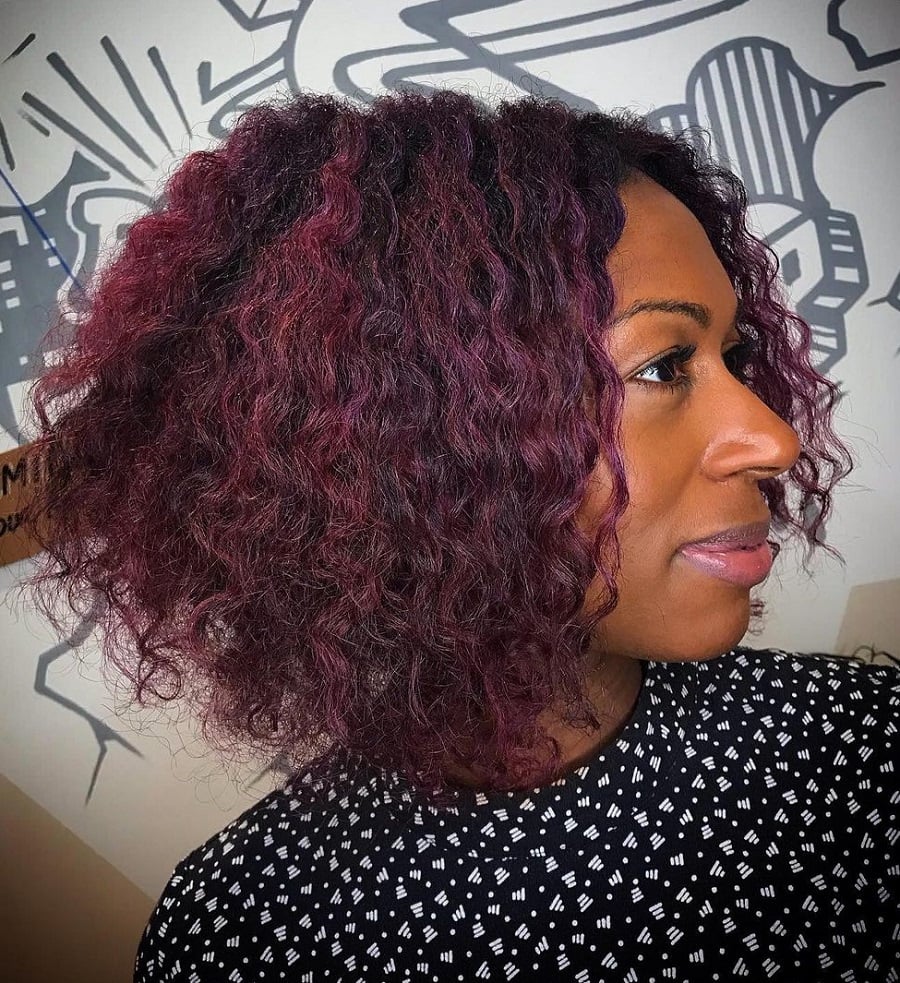 black woman with plum hair