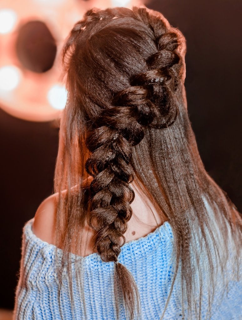 half updo with loose french braid