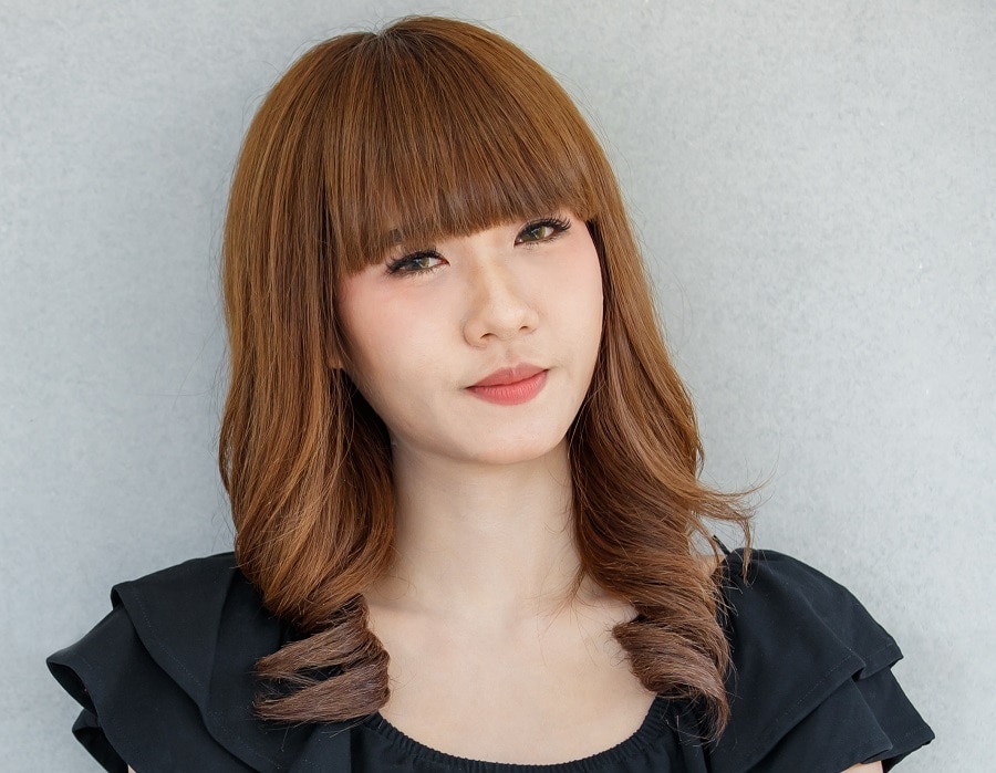 long layered Asian hairstyle with bangs