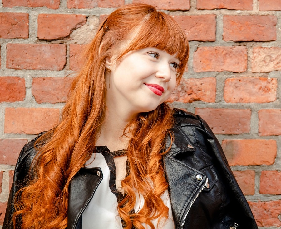 long layered red hair with bangs