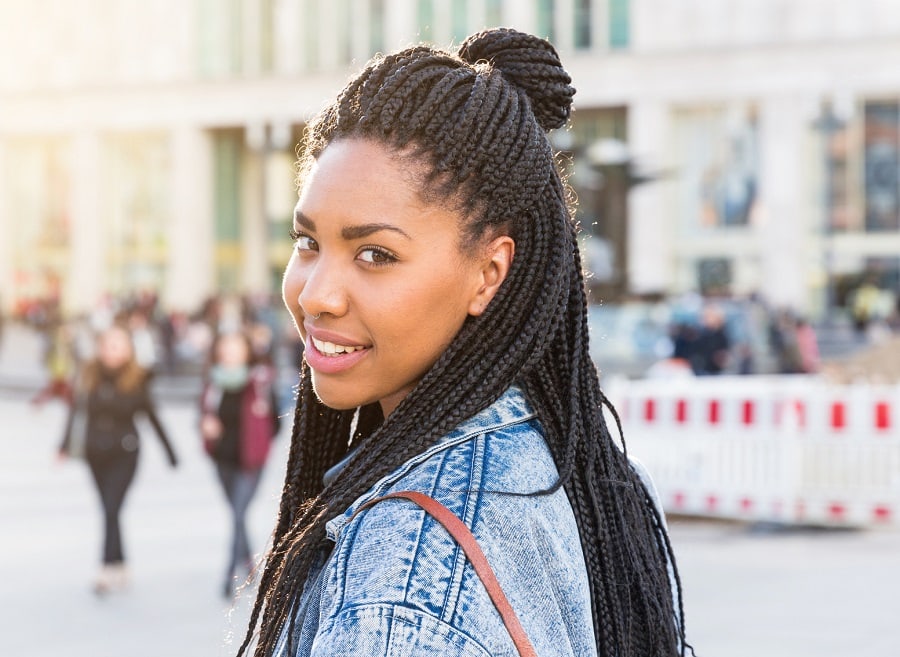 protective hairstyle with half up braids