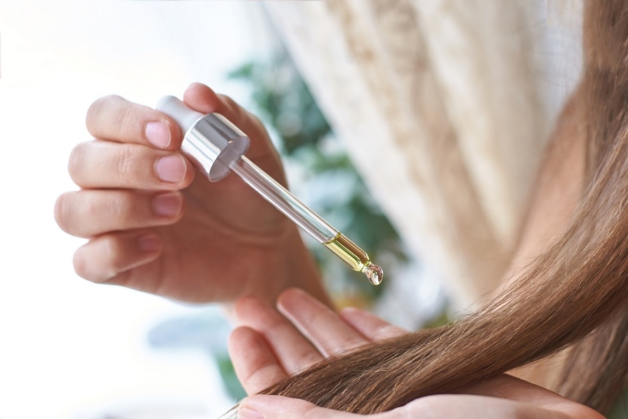 applying oil for frizzy keratin treated hair