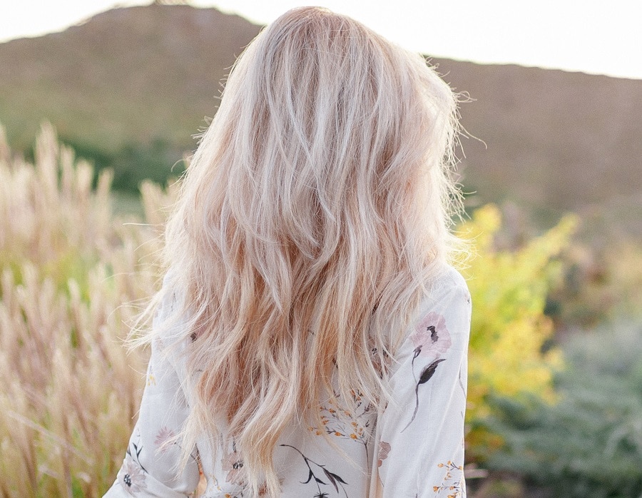 blonde wavy hair with V cut
