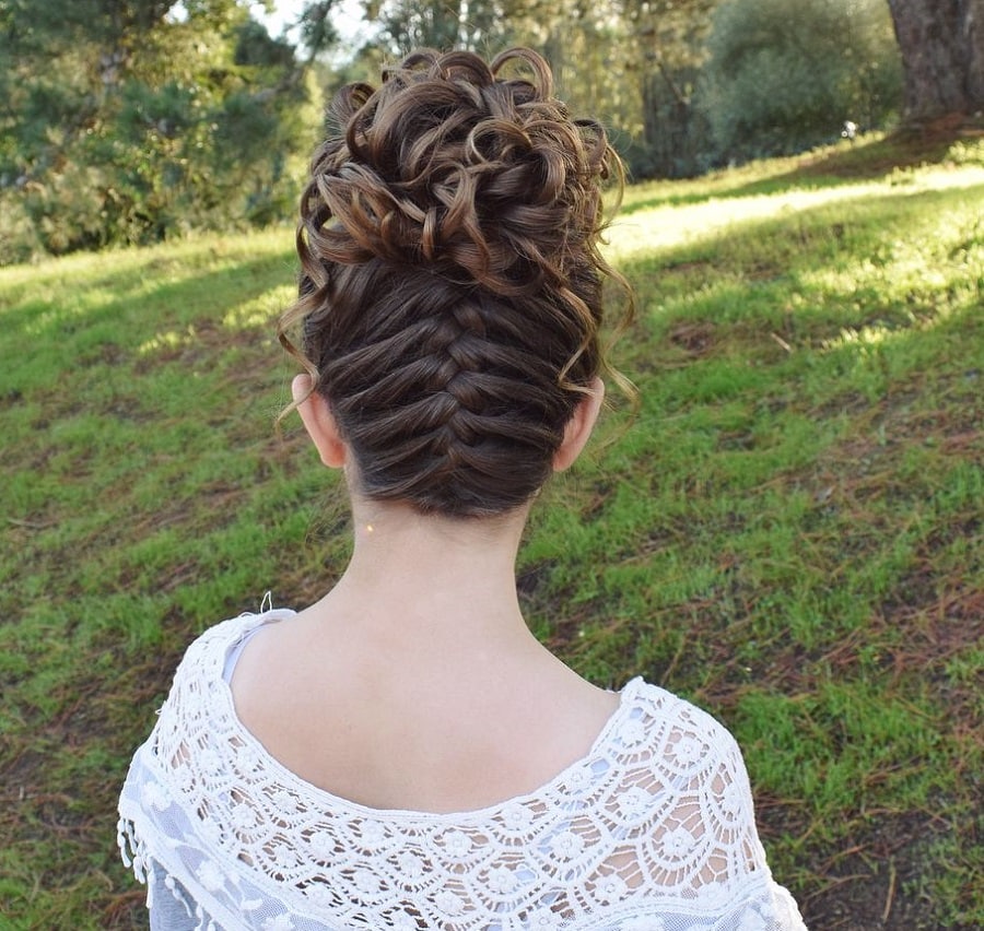 curly updo with upside down French braid