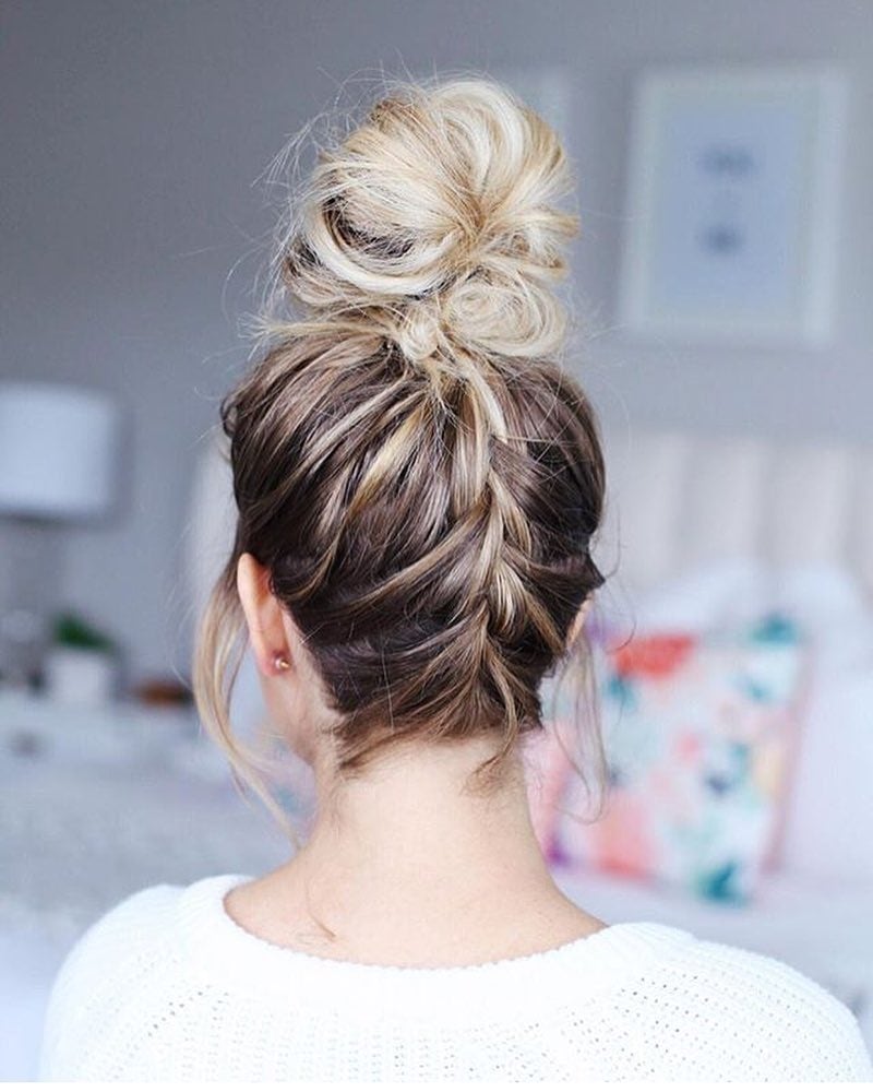 messy updo with upside down French braid