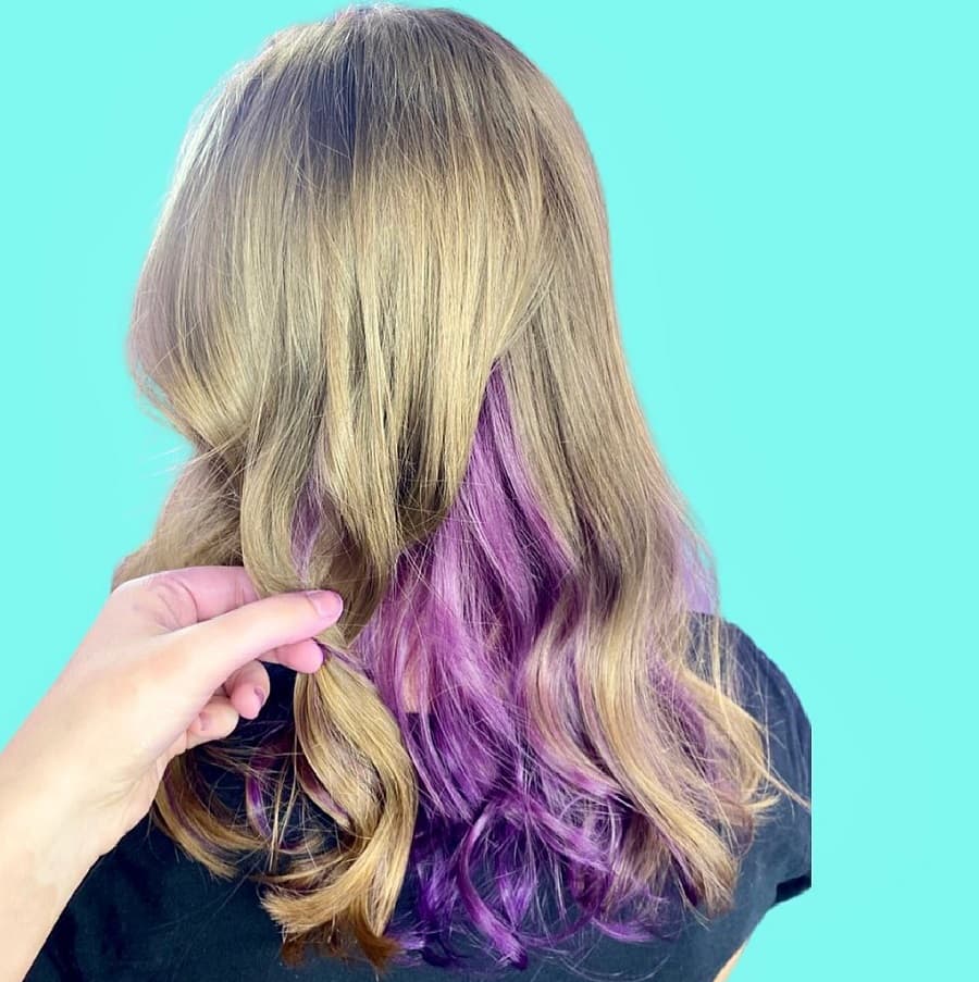 golden blonde hair with purple underneath