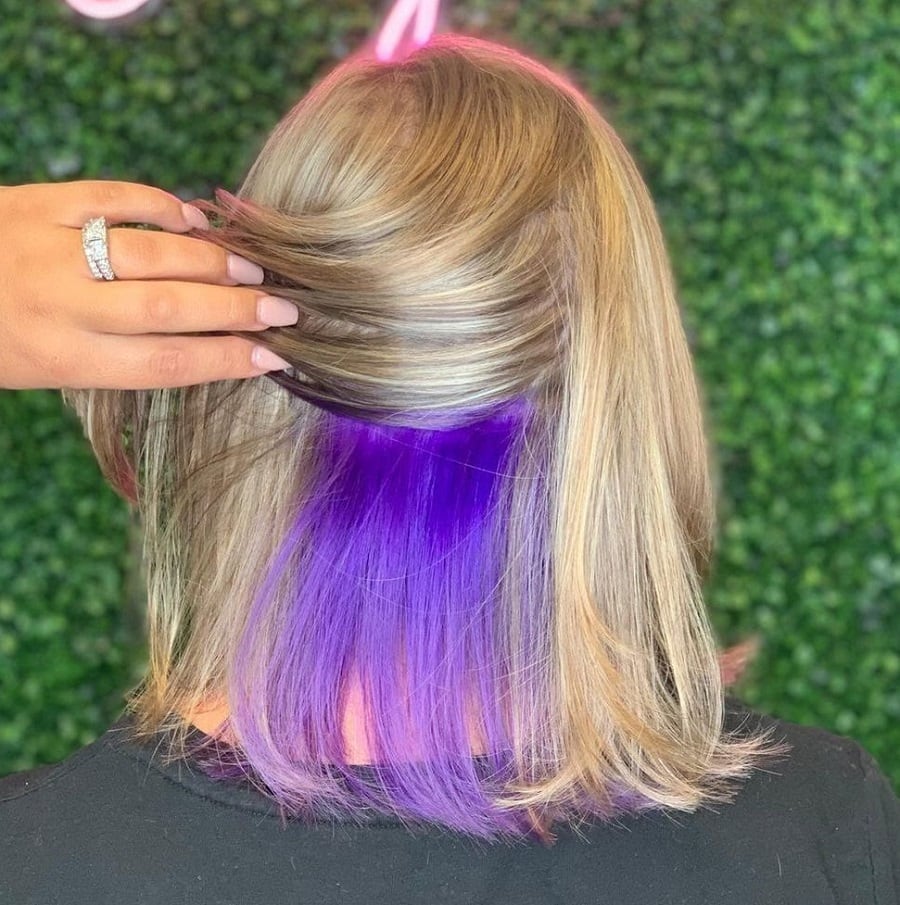 shoulder length blonde hair with purple underneath