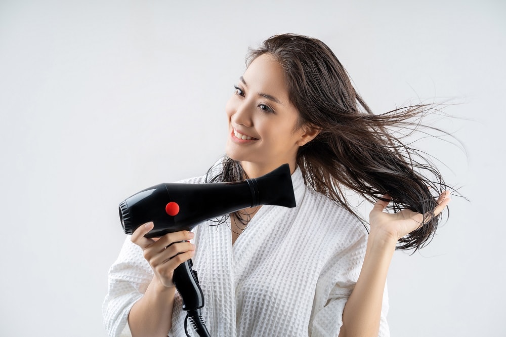Should You Blow Dry Hair Immediately After Shower?