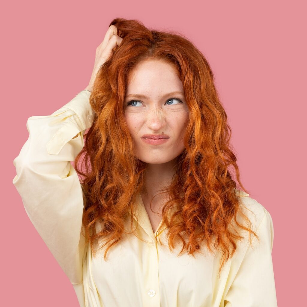 what happens if silver dye is applied on orange hair?