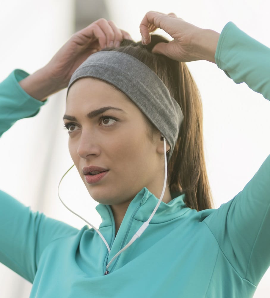 use sweatband while exercising to control sweat
