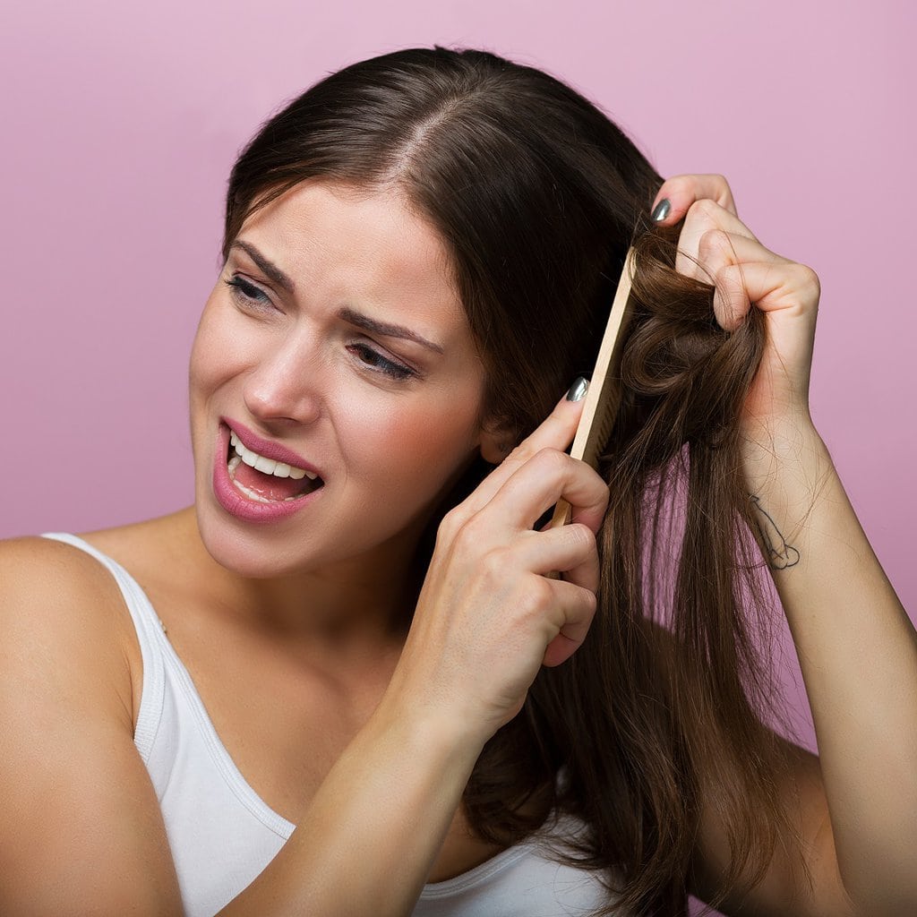why scalp hurts when combed or pressed