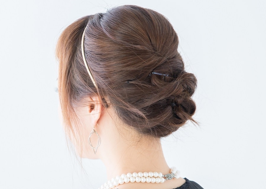 brunette updo for bridesmaid with medium hair