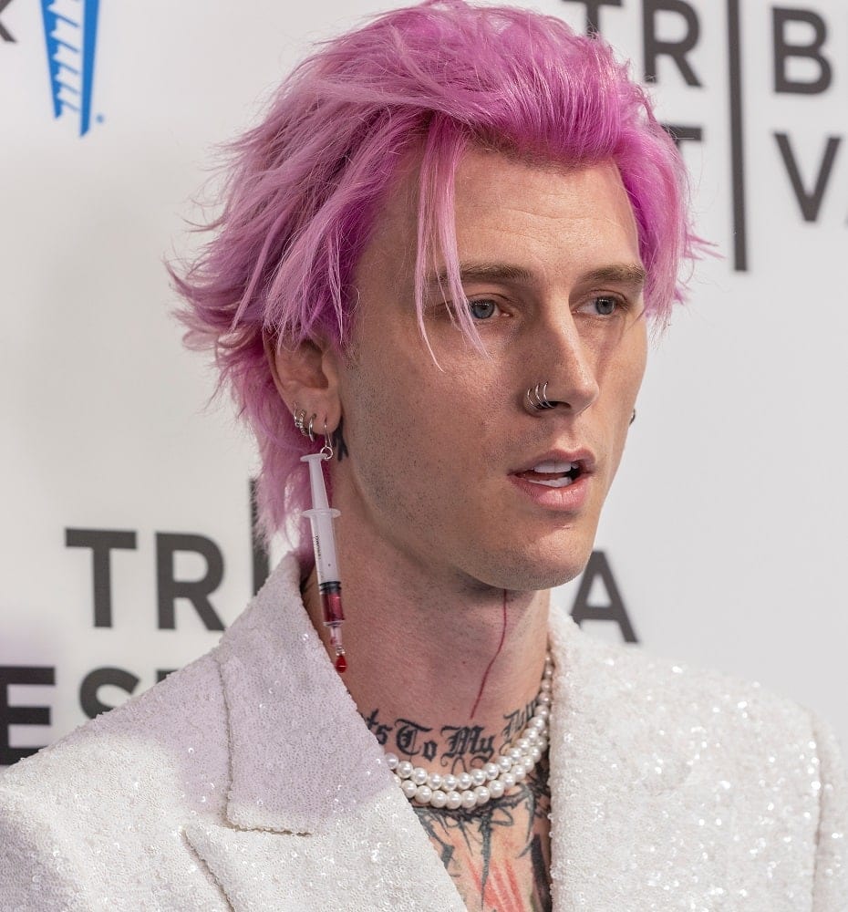 celebrity rapper with  pink hair - Machine Gun Kelly
